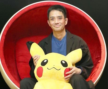 A bottom-up thinker. Satoshi Tajiri, holding a Pikachu plushy